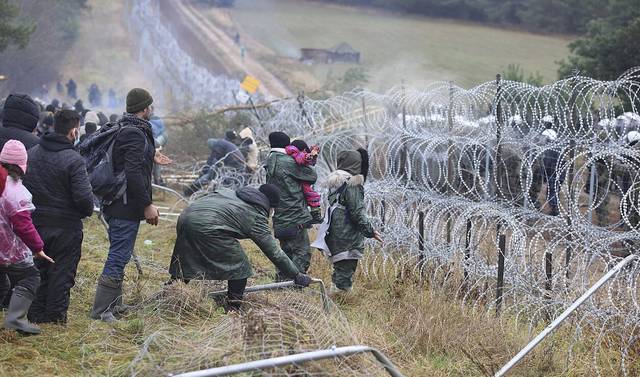 Po įvykių Lenkijos–Baltarusijos pasienyje galimiems išpuoliams ruošiasi ir Lietuva. AP nuotrauka